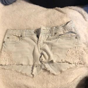 light wash jean shorts with lace
